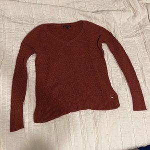 Copper knit sweater.
